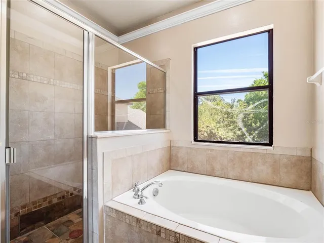 an aerial view of residential house with outdoor space