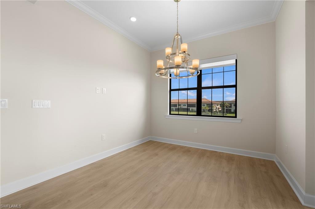 15327 Lucerna Street, Unit 204 Naples, FL 34114 - Photo 22 of 45 a view of a windows and chandelier in a room