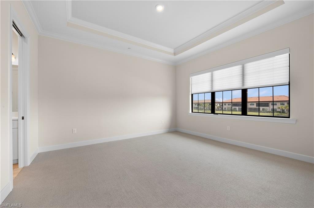 15327 Lucerna Street, Unit 204 Naples, FL 34114 - Photo 23 of 45 an empty room with windows