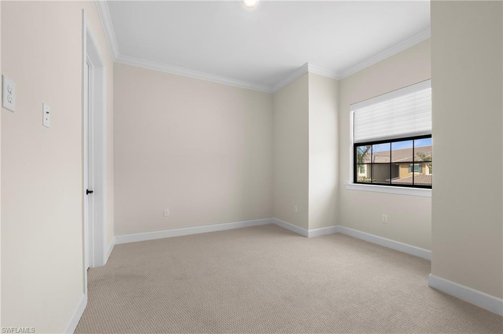 15327 Lucerna Street, Unit 204 Naples, FL 34114 - Photo 26 of 45 a view of an empty room with a window