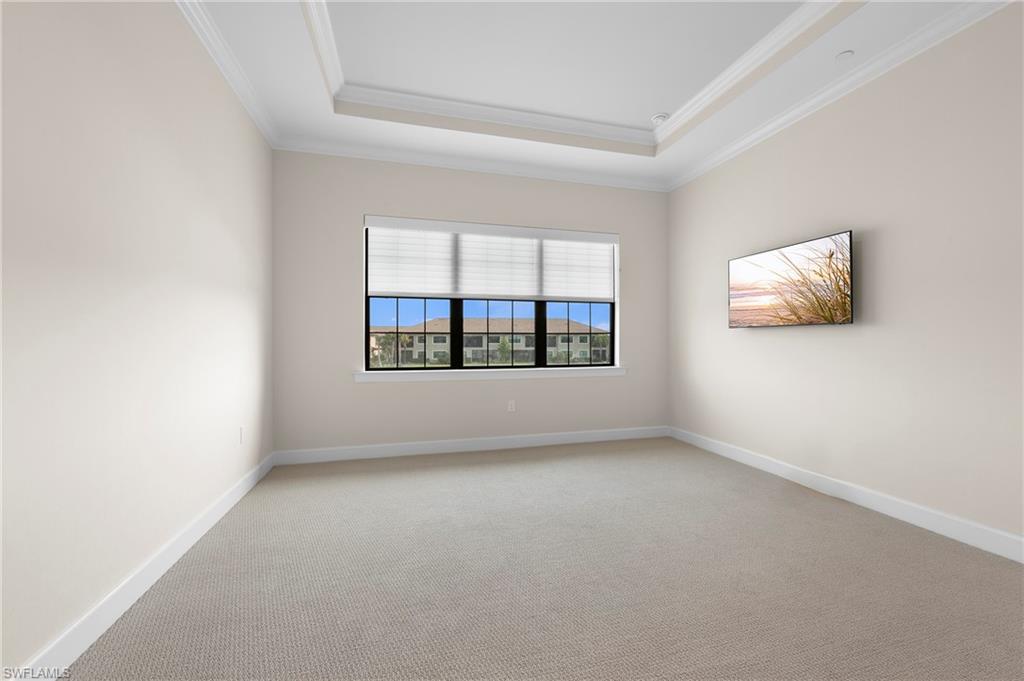 15327 Lucerna Street, Unit 204 Naples, FL 34114 - Photo 28 of 45 an empty room with windows