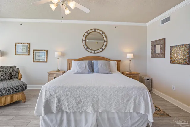 a en suite bathroom with a double vanity sink a mirror and a shower
