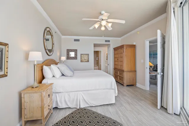 a bedroom with a bed and furniture