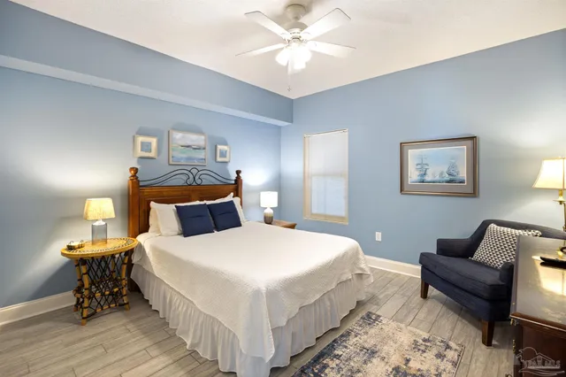 a en suite bathroom with a double vanity sink and a mirror