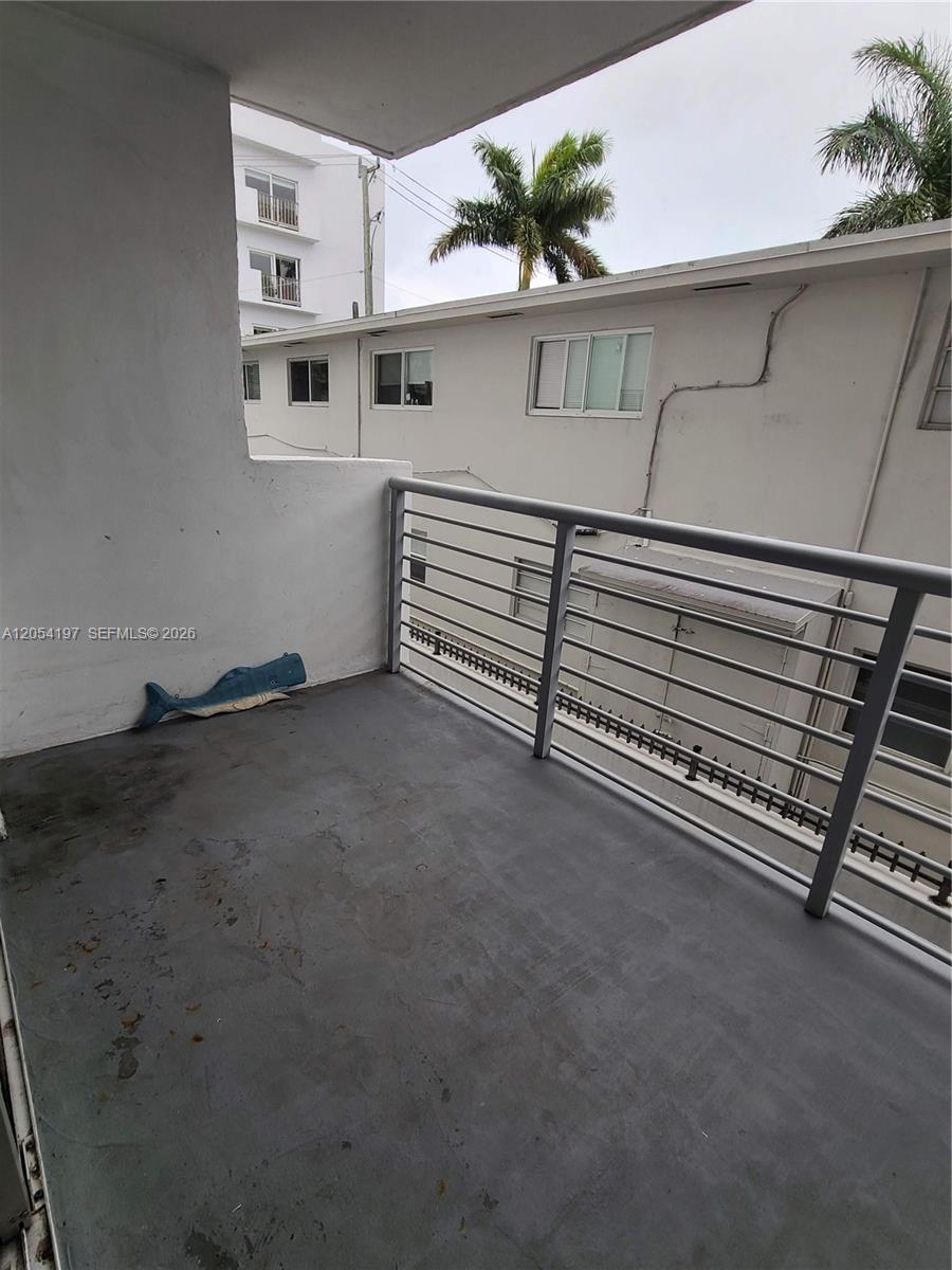1605 Bay Road, Unit 206 Miami Beach, FL 33139 - Photo 40 of 43 Very deep balcony, ready for your cozy outdoor furniture!