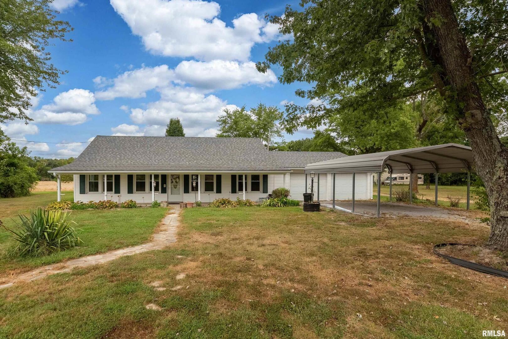 53 Private Road De Soto, IL 62924 - Photo 11 of 36 front view of a house with a big yard