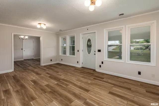 a view of a kitchen with granite countertop cabinets a sink and dishwasher