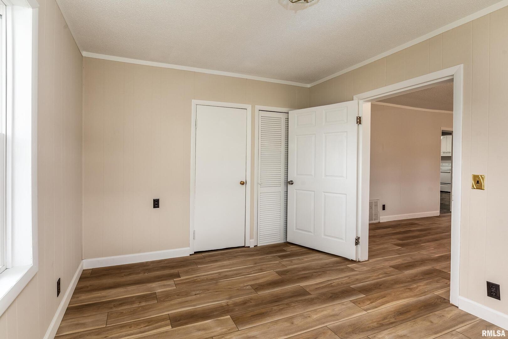 53 Private Road De Soto, IL 62924 - Photo 23 of 36 a view of a livingroom with wooden floor and closet area