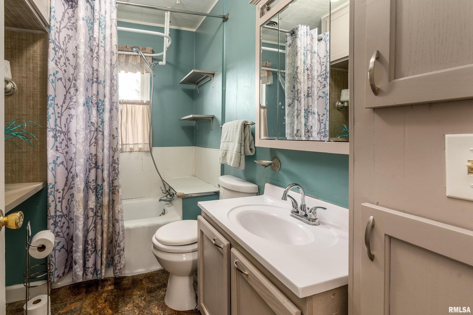 53 Private Road De Soto, IL 62924 - Photo 25 of 36 a bathroom with a sink toilet and shower