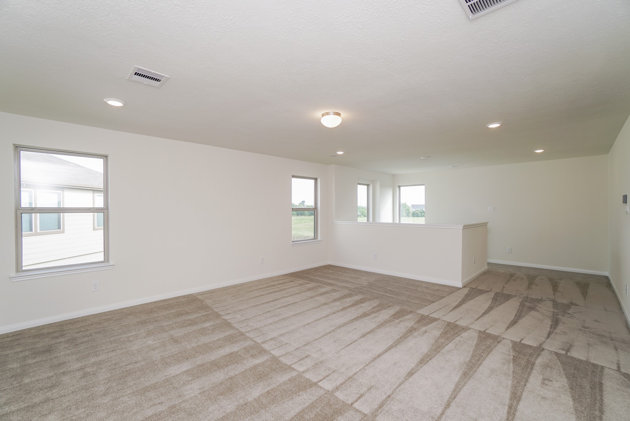 4822 Westfield Ranch Court Katy, TX 77449 - Photo 29 of 48 an empty room with windows