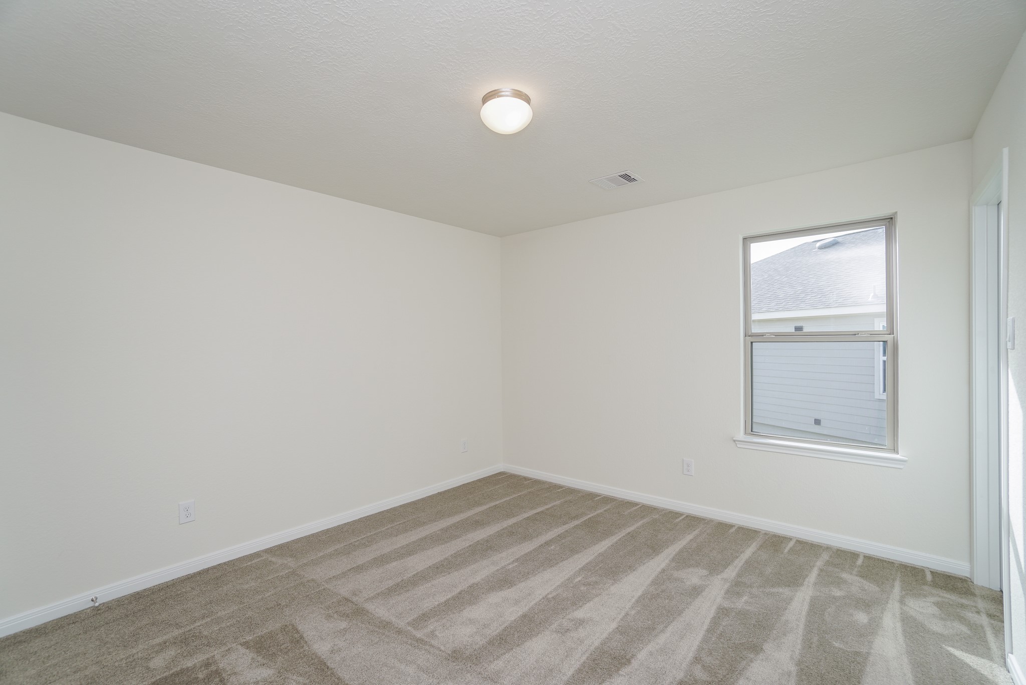 4822 Westfield Ranch Court Katy, TX 77449 - Photo 33 of 48 an empty room with a window