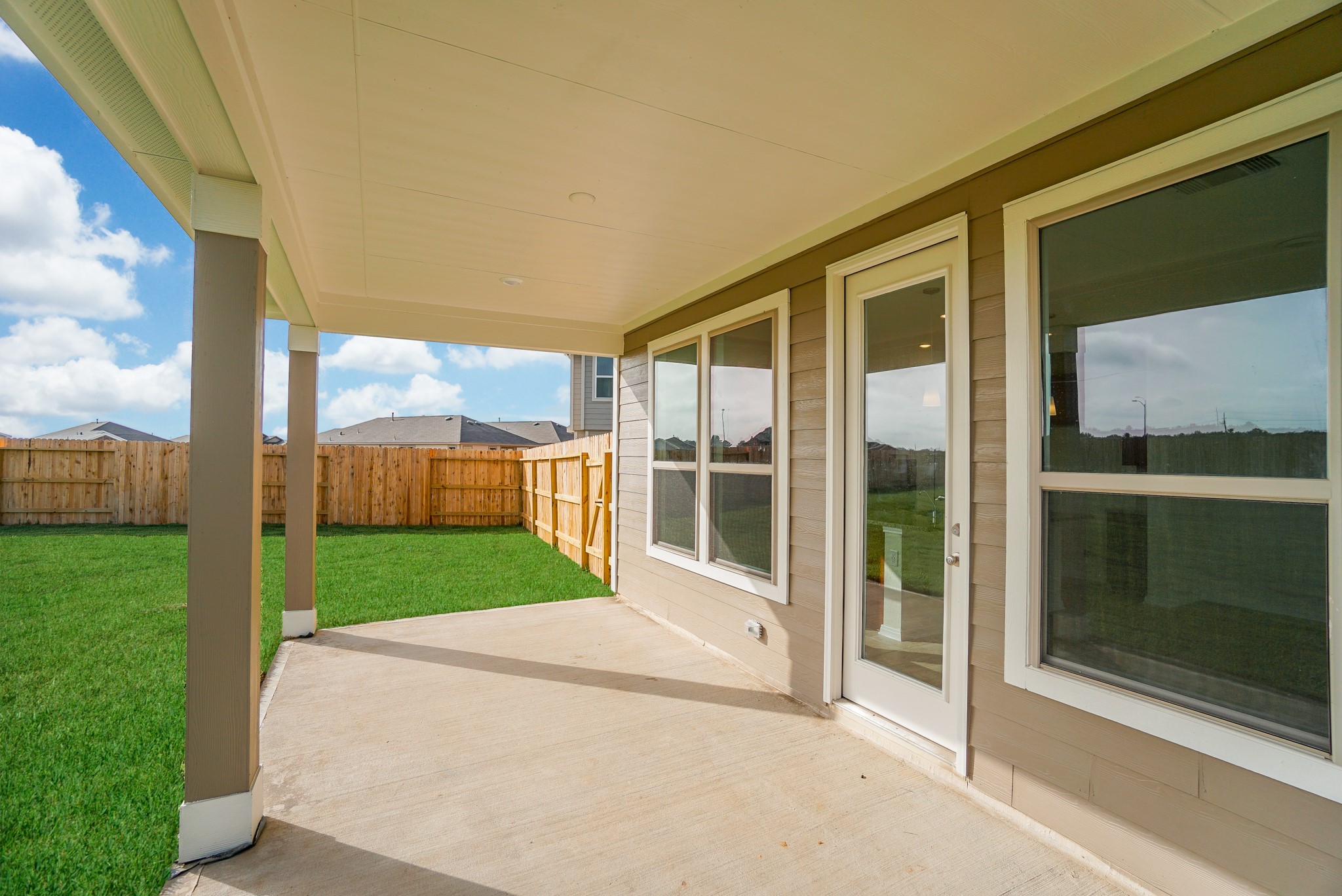 4822 Westfield Ranch Court Katy, TX 77449 - Photo 36 of 48 a view of a backyard with a garden and entryway