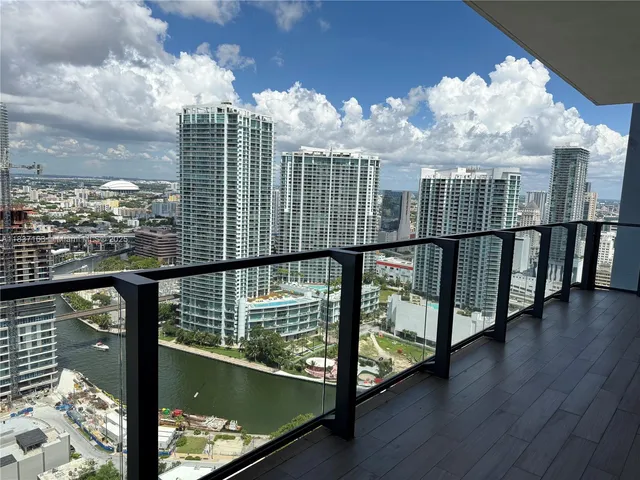 a view of a balcony with an ocean from a balcony