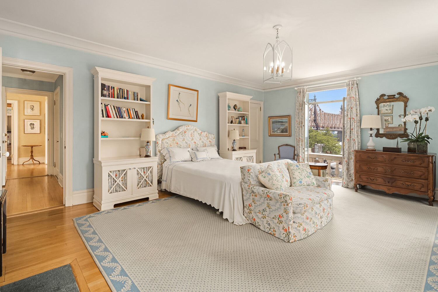 4 Sutton Place, Unit DUPLEX6/7 Manhattan, NY 10022 - Photo 12 of 19 a bed room with bed and a large window