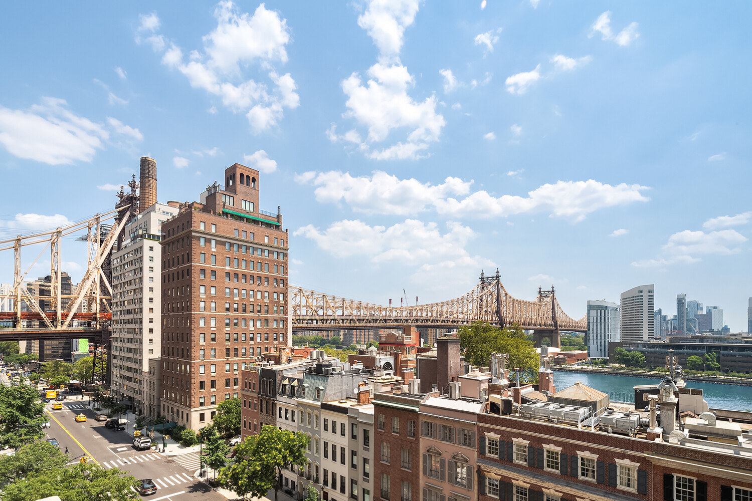 4 Sutton Place, Unit DUPLEX6/7 Manhattan, NY 10022 - Photo 15 of 19 a view of a city with tall buildings