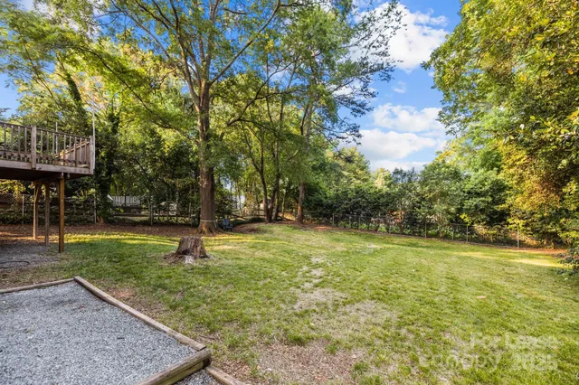 a view of a backyard with green space