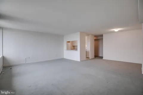 a view of an empty room with an entrance