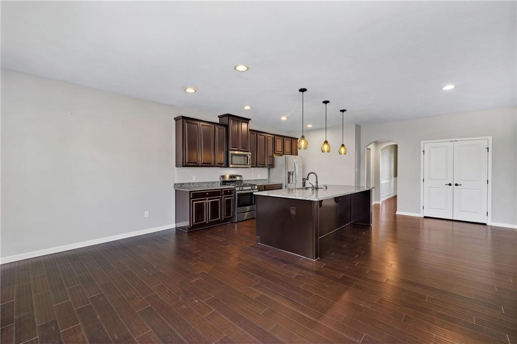 207 Gabriel Drive Mars, PA 16046 - Photo 13 of 47 a large kitchen with a center island and wooden floor