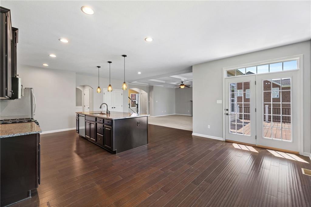 207 Gabriel Drive Mars, PA 16046 - Photo 15 of 47 a living room with hard wood floors and a kitchen
