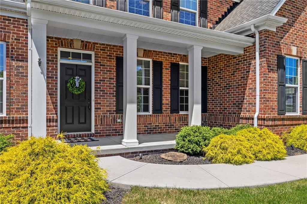 207 Gabriel Drive Mars, PA 16046 - Photo 2 of 47 a front view of a house with a lots of windows and plants