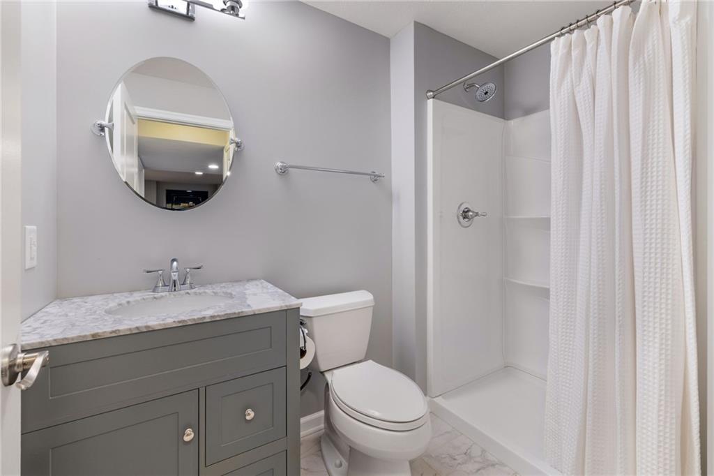 207 Gabriel Drive Mars, PA 16046 - Photo 24 of 47 a bathroom with a toilet sink and mirror