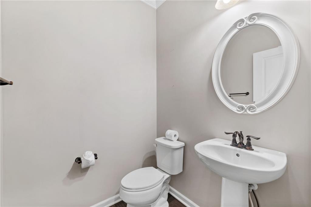 207 Gabriel Drive Mars, PA 16046 - Photo 31 of 47 a bathroom with a sink a mirror and a toilet