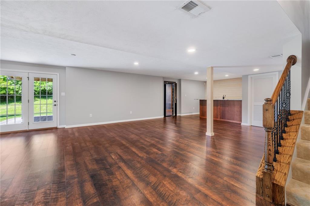 207 Gabriel Drive Mars, PA 16046 - Photo 32 of 47 a view of empty room with wooden floor and a window
