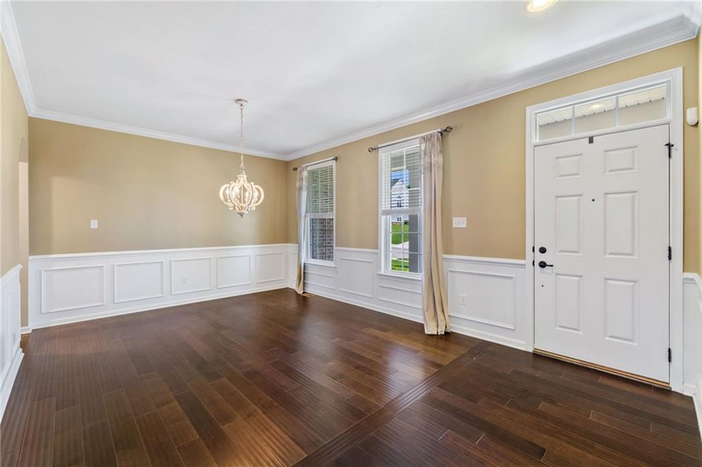 207 Gabriel Drive Mars, PA 16046 - Photo 7 of 47 wooden floor in an empty room with a window
