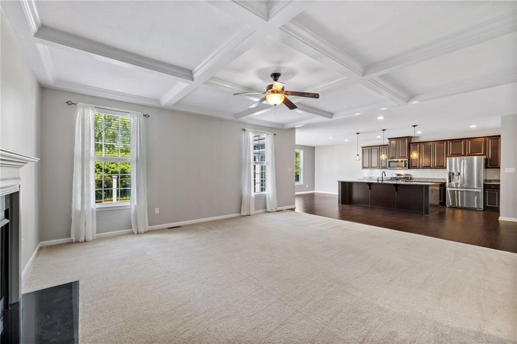 207 Gabriel Drive Mars, PA 16046 - Photo 10 of 47 a view of an empty room with kitchen and window
