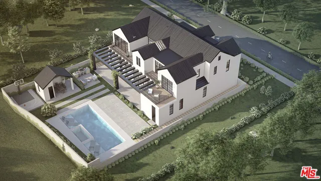 a view of a house with a yard and plants