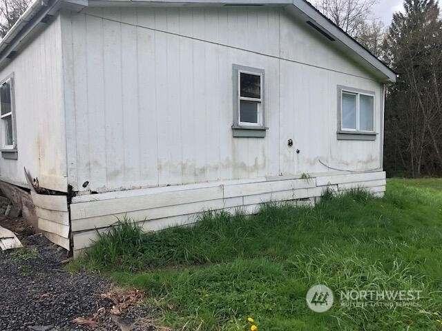 237 Sommerville Road Chehalis, WA 98532 - Photo 6 of 28 a view of a house with backyard and garden