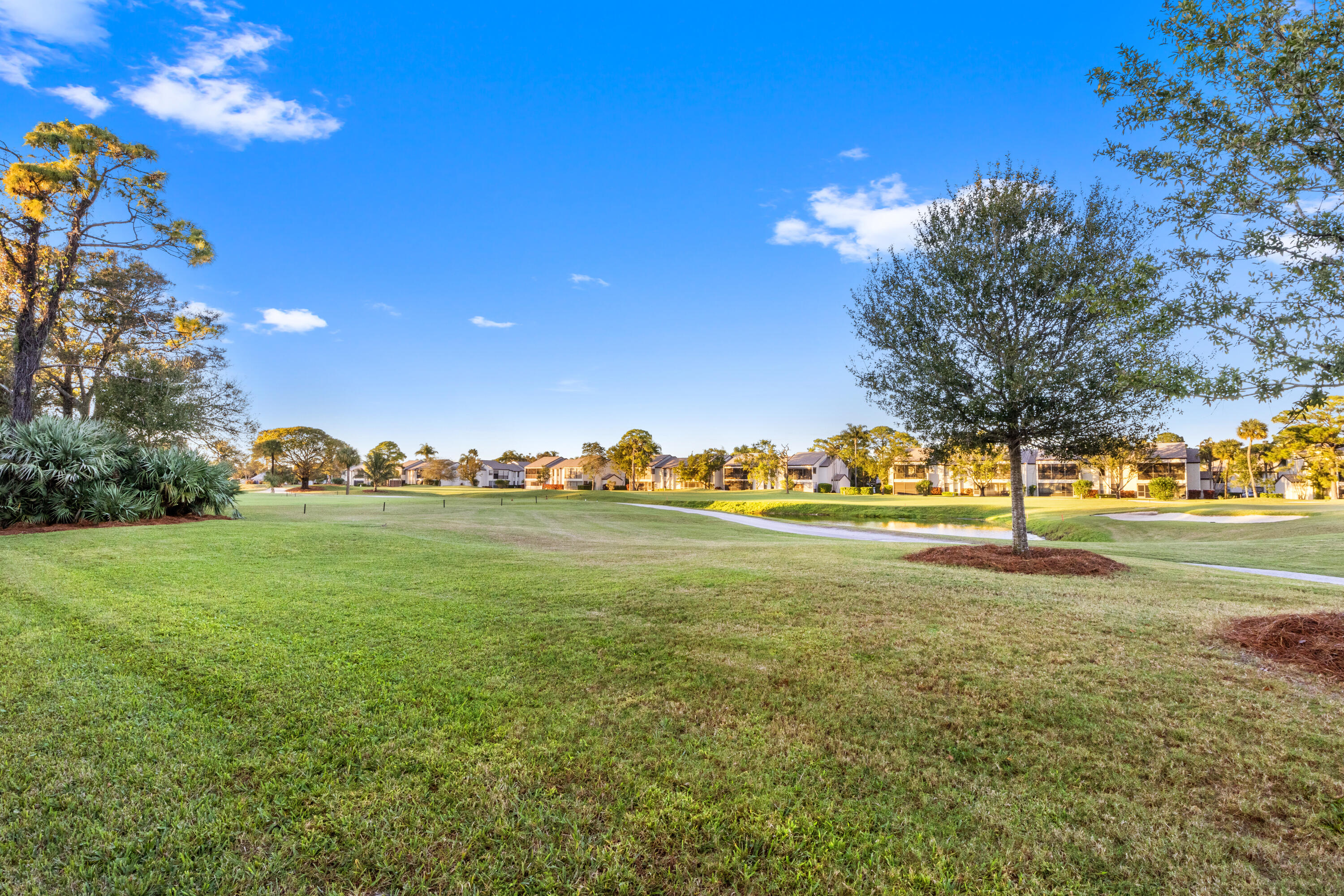 702 Pinecrest Circle, Unit F Jupiter, FL 33458 - Photo 24 of 28 25 Rear 02