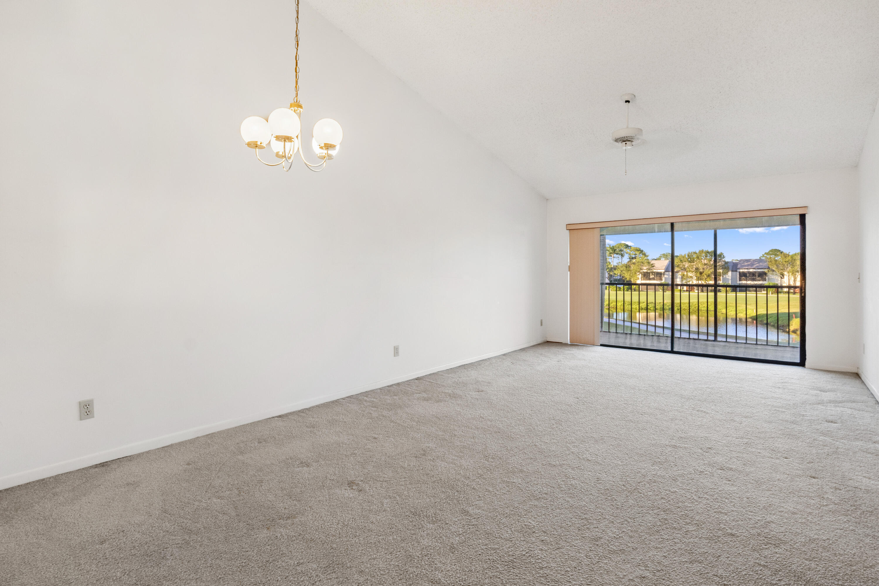 702 Pinecrest Circle, Unit F Jupiter, FL 33458 - Photo 5 of 28 06 Living room 01