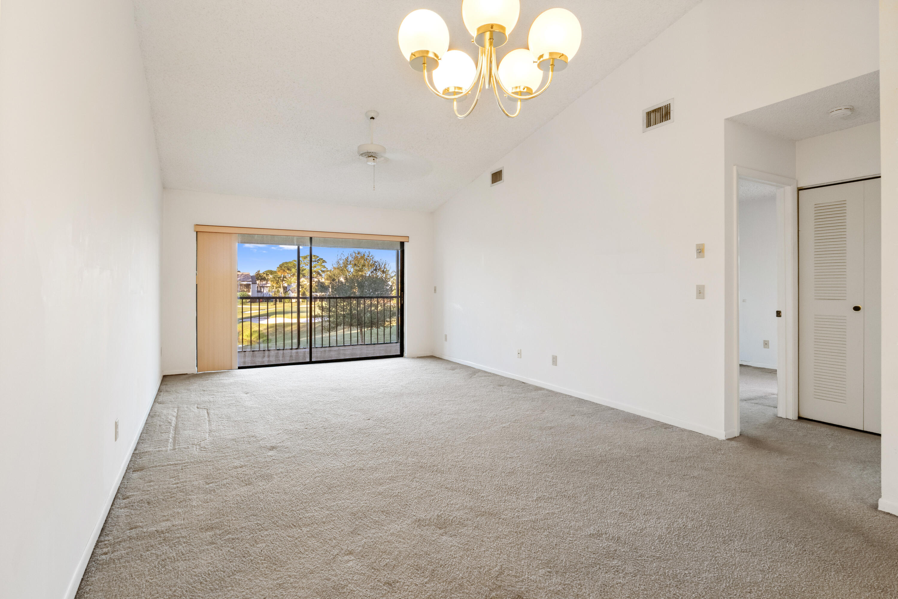 702 Pinecrest Circle, Unit F Jupiter, FL 33458 - Photo 8 of 28 09 Living room 04