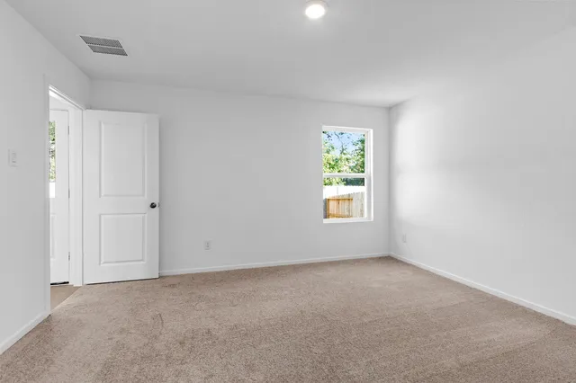 an empty room with windows