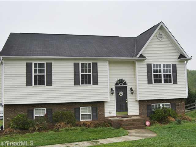 6961 Channel Forest Road Belews Creek, NC 27009 - Photo 1 of 13 Exterior Front.