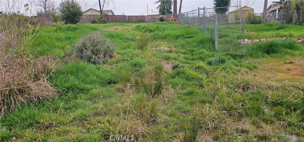5832 Ingalls Road Paradise, CA 95969 - Photo 4 of 4 a view of a garden with a building in front of it