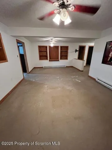 a view of a room with a rug