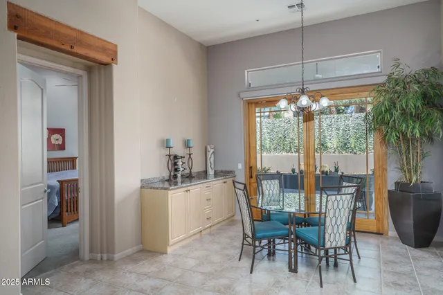 a living room with furniture a window and a fireplace