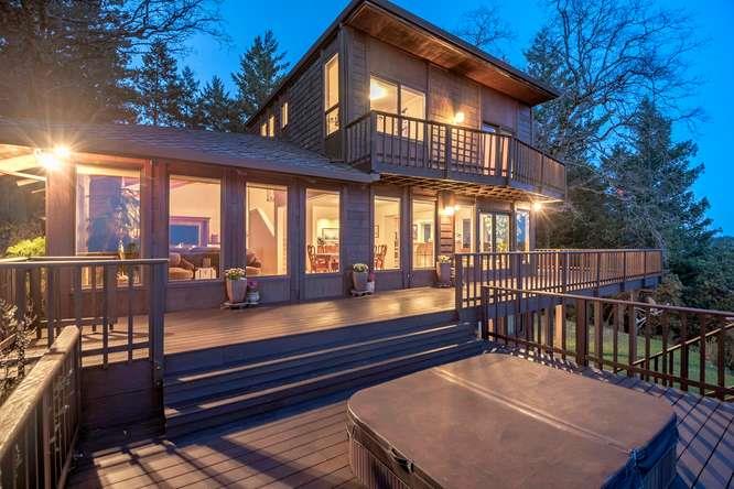 22154 Miller Ridge Road Los Gatos, CA 95033 - Photo 12 of 19 a view of a balcony with chairs and wooden floor