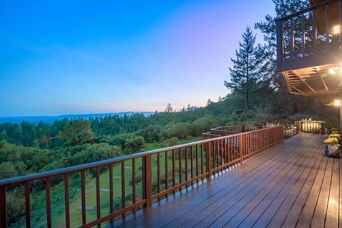 22154 Miller Ridge Road Los Gatos, CA 95033 - Photo 14 of 19 a view of a balcony with wooden fence