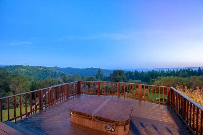 22154 Miller Ridge Road Los Gatos, CA 95033 - Photo 15 of 19 a view of a wooden deck with mountain view