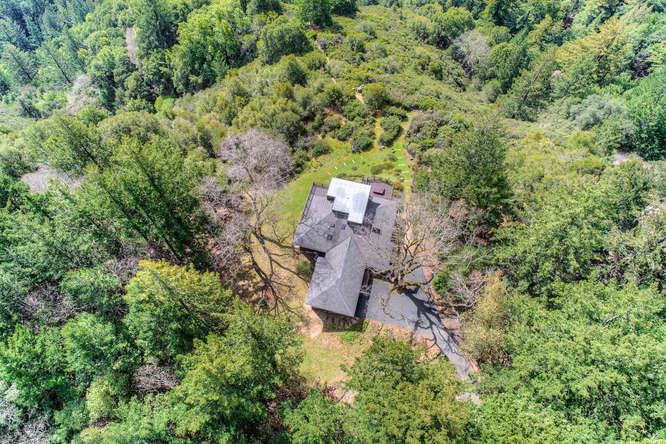 22154 Miller Ridge Road Los Gatos, CA 95033 - Photo 19 of 19 an aerial view of a house with a yard and outdoor seating