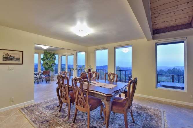 22154 Miller Ridge Road Los Gatos, CA 95033 - Photo 4 of 19 a view of a dining room with furniture window and wooden floor