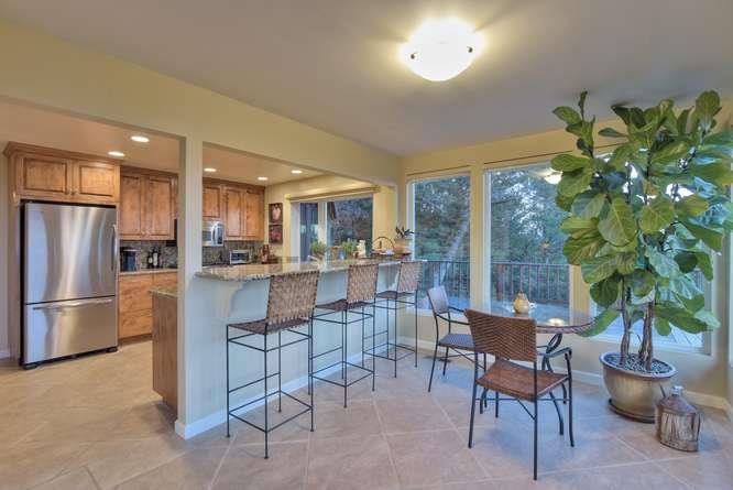 22154 Miller Ridge Road Los Gatos, CA 95033 - Photo 5 of 19 a kitchen with a refrigerator and a potted plant