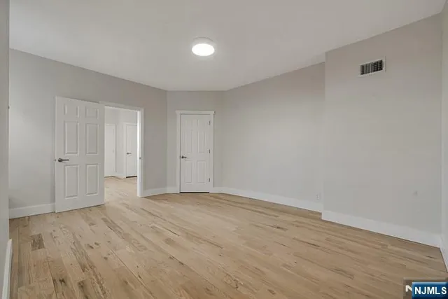 a view of workspace with furniture and windows