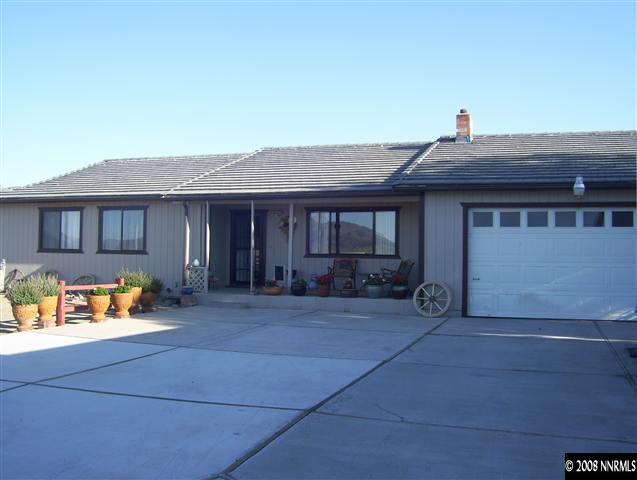 11590 Osage Road Reno, NV 89508 - Photo 1 of 9 a view of a house with patio