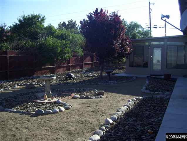 11590 Osage Road Reno, NV 89508 - Photo 9 of 9 a view of a backyard of the house