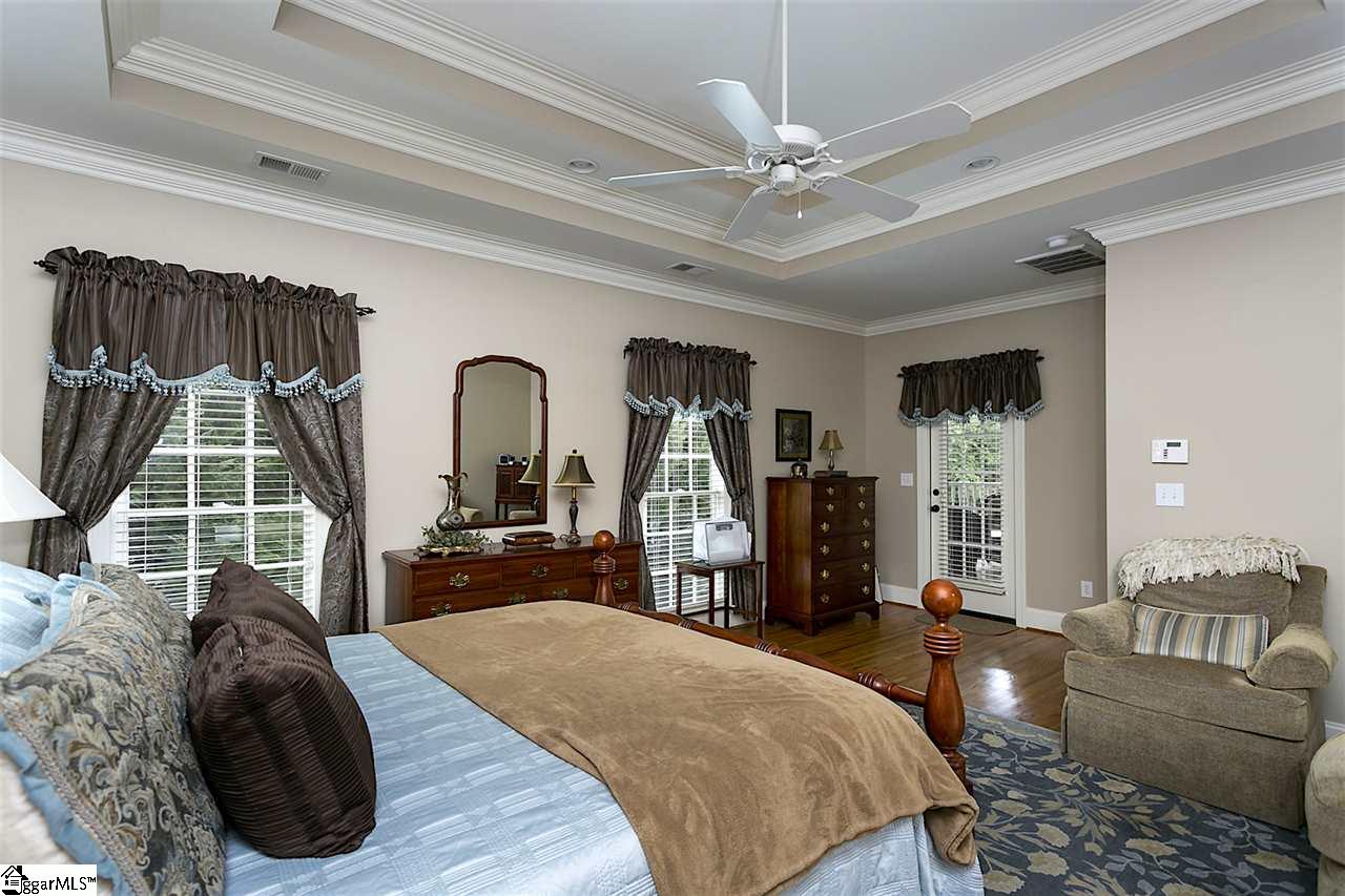 107 Marsh Spring Court Greer, SC 29650 - Photo 24 of 36 Trey ceiling & access to covered Porch