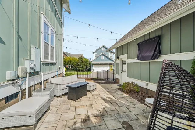 a front view of residential house with parking space